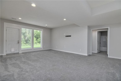 This BEAUTIFUL HOME backs to and walks out to a fully treed on Falcon Lakes Golf Course in Kansas - for sale on GolfHomes.com, golf home, golf lot