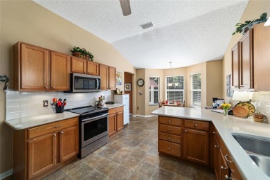 This beautifully maintained Whispering Pines model with NO BOND on Glenview Championship Golf and Country Club in Florida - for sale on GolfHomes.com, golf home, golf lot