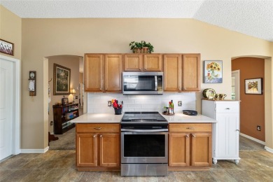 This beautifully maintained Whispering Pines model with NO BOND on Glenview Championship Golf and Country Club in Florida - for sale on GolfHomes.com, golf home, golf lot