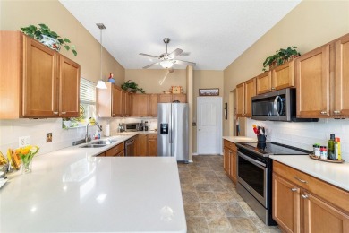 This beautifully maintained Whispering Pines model with NO BOND on Glenview Championship Golf and Country Club in Florida - for sale on GolfHomes.com, golf home, golf lot