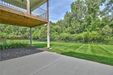 This BEAUTIFUL HOME backs to and walks out to a fully treed on Falcon Lakes Golf Course in Kansas - for sale on GolfHomes.com, golf home, golf lot