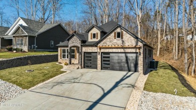 This stunning new construction home is located in the highly on Toqua Golf Course - Loudon County in Tennessee - for sale on GolfHomes.com, golf home, golf lot