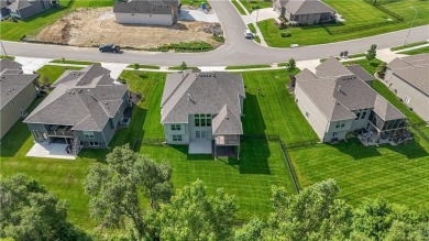 This BEAUTIFUL HOME backs to and walks out to a fully treed on Falcon Lakes Golf Course in Kansas - for sale on GolfHomes.com, golf home, golf lot