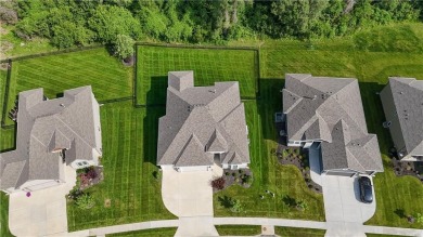 This BEAUTIFUL HOME backs to and walks out to a fully treed on Falcon Lakes Golf Course in Kansas - for sale on GolfHomes.com, golf home, golf lot