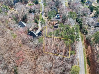 This serene wooded lot in Ford's Colony features a gentle slope on Fords Colony Country Club in Virginia - for sale on GolfHomes.com, golf home, golf lot