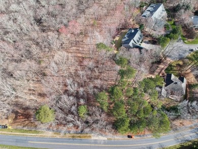 This serene wooded lot in Ford's Colony features a gentle slope on Fords Colony Country Club in Virginia - for sale on GolfHomes.com, golf home, golf lot
