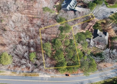 This serene wooded lot in Ford's Colony features a gentle slope on Fords Colony Country Club in Virginia - for sale on GolfHomes.com, golf home, golf lot