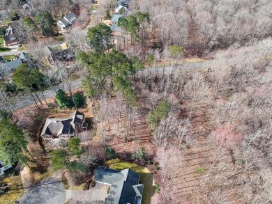 This serene wooded lot in Ford's Colony features a gentle slope on Fords Colony Country Club in Virginia - for sale on GolfHomes.com, golf home, golf lot