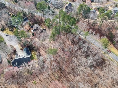 This serene wooded lot in Ford's Colony features a gentle slope on Fords Colony Country Club in Virginia - for sale on GolfHomes.com, golf home, golf lot