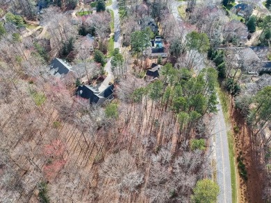 This serene wooded lot in Ford's Colony features a gentle slope on Fords Colony Country Club in Virginia - for sale on GolfHomes.com, golf home, golf lot