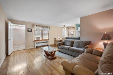 Welcome to this bright, first-floor corner unit in Trousdell on Glen Head Country Club in New York - for sale on GolfHomes.com, golf home, golf lot