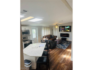 Turnkey Naples Living in a Vibrant 55+ Community! This on Riviera Golf Club in Florida - for sale on GolfHomes.com, golf home, golf lot