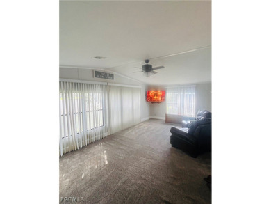 Turnkey Naples Living in a Vibrant 55+ Community! This on Riviera Golf Club in Florida - for sale on GolfHomes.com, golf home, golf lot