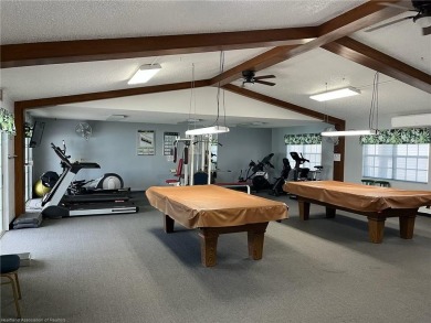 ESCAPE THE HUSTLE AND BUSTLE OF BIG CITY LIVING! THIS BEAUTIFUL on Bluffs Golf Course in Florida - for sale on GolfHomes.com, golf home, golf lot