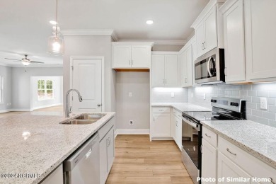 Experience the ease of single-level living in the Somerset III on Green Hills Golf Course in North Carolina - for sale on GolfHomes.com, golf home, golf lot