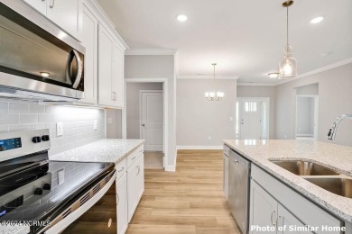 Experience the ease of single-level living in the Somerset III on Green Hills Golf Course in North Carolina - for sale on GolfHomes.com, golf home, golf lot