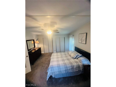 Turnkey Naples Living in a Vibrant 55+ Community! This on Riviera Golf Club in Florida - for sale on GolfHomes.com, golf home, golf lot