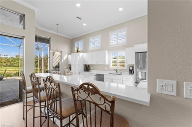 Enjoy exceptional privacy and breathtaking panoramic lake and on Estero Country Club in Florida - for sale on GolfHomes.com, golf home, golf lot