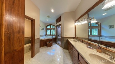 This executive home features 6750 sq. ft. Conveniently located on Marquette Golf Club in Michigan - for sale on GolfHomes.com, golf home, golf lot