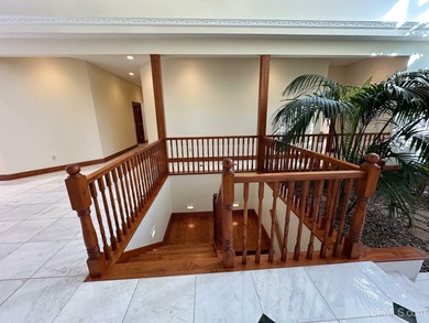 This executive home features 6528 sq. ft. of luxurious space on Marquette Golf Club in Michigan - for sale on GolfHomes.com, golf home, golf lot