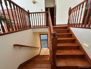 This executive home features 6528 sq. ft. of luxurious space on Marquette Golf Club in Michigan - for sale on GolfHomes.com, golf home, golf lot