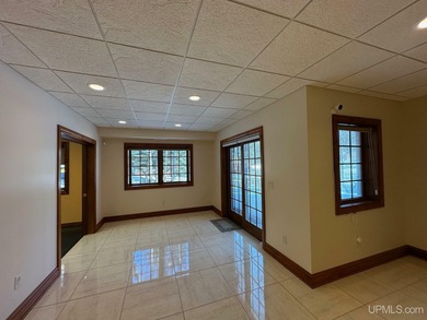 This executive home features 6528 sq. ft. of luxurious space on Marquette Golf Club in Michigan - for sale on GolfHomes.com, golf home, golf lot