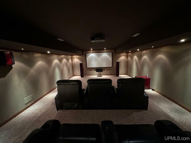 This executive home features 6528 sq. ft. of luxurious space on Marquette Golf Club in Michigan - for sale on GolfHomes.com, golf home, golf lot