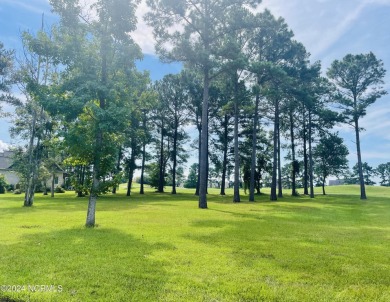 Welcome to coastal living at its finest in Crow Creek! This on Crow Creek Golf Club in North Carolina - for sale on GolfHomes.com, golf home, golf lot