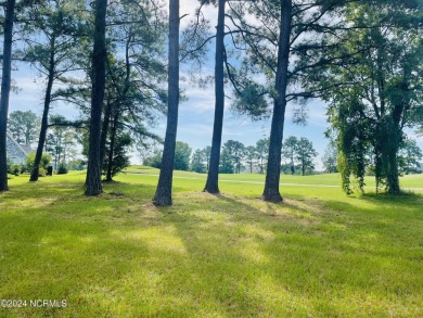 Welcome to coastal living at its finest in Crow Creek! This on Crow Creek Golf Club in North Carolina - for sale on GolfHomes.com, golf home, golf lot