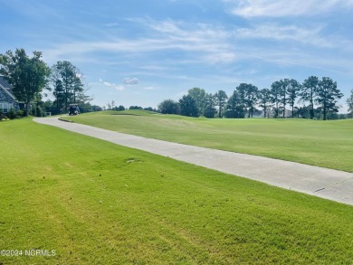 Welcome to coastal living at its finest in Crow Creek! This on Crow Creek Golf Club in North Carolina - for sale on GolfHomes.com, golf home, golf lot
