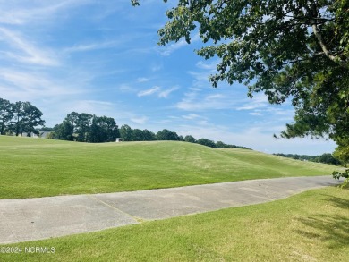 Welcome to coastal living at its finest in Crow Creek! This on Crow Creek Golf Club in North Carolina - for sale on GolfHomes.com, golf home, golf lot
