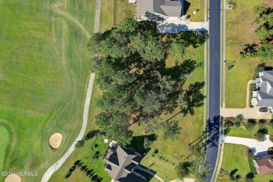 Welcome to coastal living at its finest in Crow Creek! This on Crow Creek Golf Club in North Carolina - for sale on GolfHomes.com, golf home, golf lot