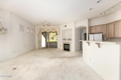 Golf Course unit! Outstanding two bedroom, two bathroom + Den on Starfire At Scottsdale Country Club in Arizona - for sale on GolfHomes.com, golf home, golf lot