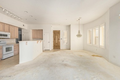 Golf Course unit! Outstanding two bedroom, two bathroom + Den on Starfire At Scottsdale Country Club in Arizona - for sale on GolfHomes.com, golf home, golf lot