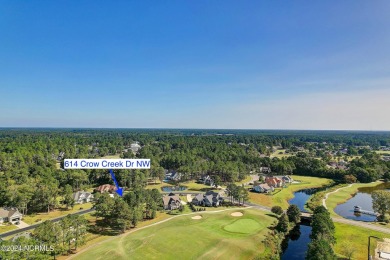 Welcome to coastal living at its finest in Crow Creek! This on Crow Creek Golf Club in North Carolina - for sale on GolfHomes.com, golf home, golf lot