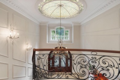 This exquisite European-style home is nestled off a quiet on Horseshoe Bend Country Club in Georgia - for sale on GolfHomes.com, golf home, golf lot