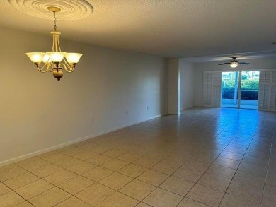 Beautiful 1st floor golf course condo in the City of Atlantis on Atlantis Golf Club in Florida - for sale on GolfHomes.com, golf home, golf lot