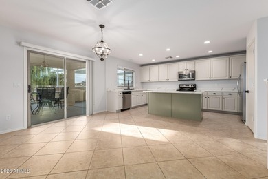 Step inside this beautifully updated 4-bedroom, 2.5-bath home on Dave White Reg Park and Golf Course in Arizona - for sale on GolfHomes.com, golf home, golf lot