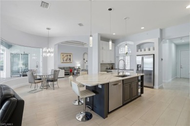 Experience the pinnacle of waterfront living at 18361 Verona on Miromar Lakes Golf Club in Florida - for sale on GolfHomes.com, golf home, golf lot
