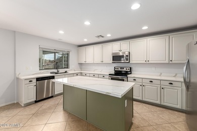 Step inside this beautifully updated 4-bedroom, 2.5-bath home on Dave White Reg Park and Golf Course in Arizona - for sale on GolfHomes.com, golf home, golf lot