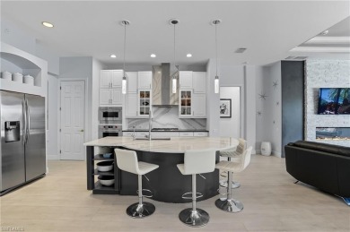 Experience the pinnacle of waterfront living at 18361 Verona on Miromar Lakes Golf Club in Florida - for sale on GolfHomes.com, golf home, golf lot