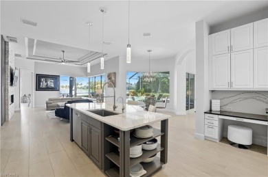 Experience the pinnacle of waterfront living at 18361 Verona on Miromar Lakes Golf Club in Florida - for sale on GolfHomes.com, golf home, golf lot