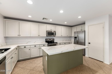 Step inside this beautifully updated 4-bedroom, 2.5-bath home on Dave White Reg Park and Golf Course in Arizona - for sale on GolfHomes.com, golf home, golf lot