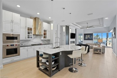 Experience the pinnacle of waterfront living at 18361 Verona on Miromar Lakes Golf Club in Florida - for sale on GolfHomes.com, golf home, golf lot