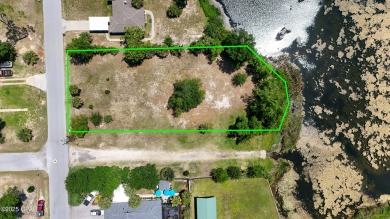 WATERFRONT! Large lot located in the highly desired 'Lynn Haven' on Panama Country Club in Florida - for sale on GolfHomes.com, golf home, golf lot