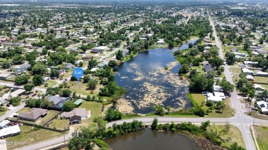 WATERFRONT! Large lot located in the highly desired 'Lynn Haven' on Panama Country Club in Florida - for sale on GolfHomes.com, golf home, golf lot
