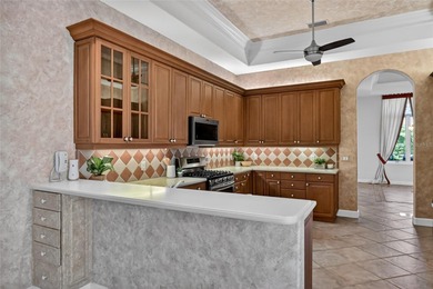 Elegant Golf Course Retreat in Rosedale Golf & Country Club - on Rosedale Golf and Tennis Club in Florida - for sale on GolfHomes.com, golf home, golf lot