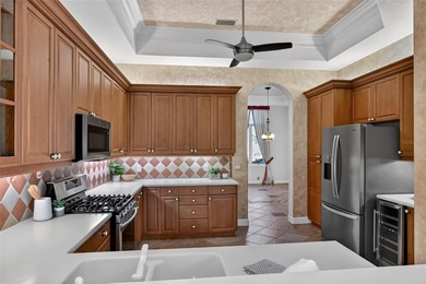 Elegant Golf Course Retreat in Rosedale Golf & Country Club - on Rosedale Golf and Tennis Club in Florida - for sale on GolfHomes.com, golf home, golf lot