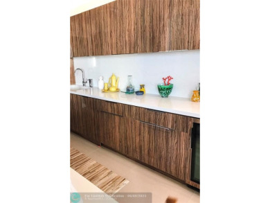 Turnkey and beautifully remodeled, this fully furnished on Turnberry Isle Resort and Club in Florida - for sale on GolfHomes.com, golf home, golf lot
