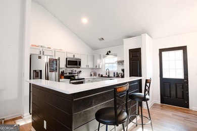 Welcome home to this charming 3-bedroom, 2-bath ranch located in on Turtle Cove Golf Course in Georgia - for sale on GolfHomes.com, golf home, golf lot